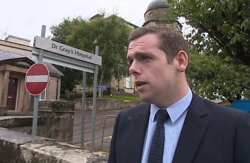 Douglas Ross MP outside Dr Gray's