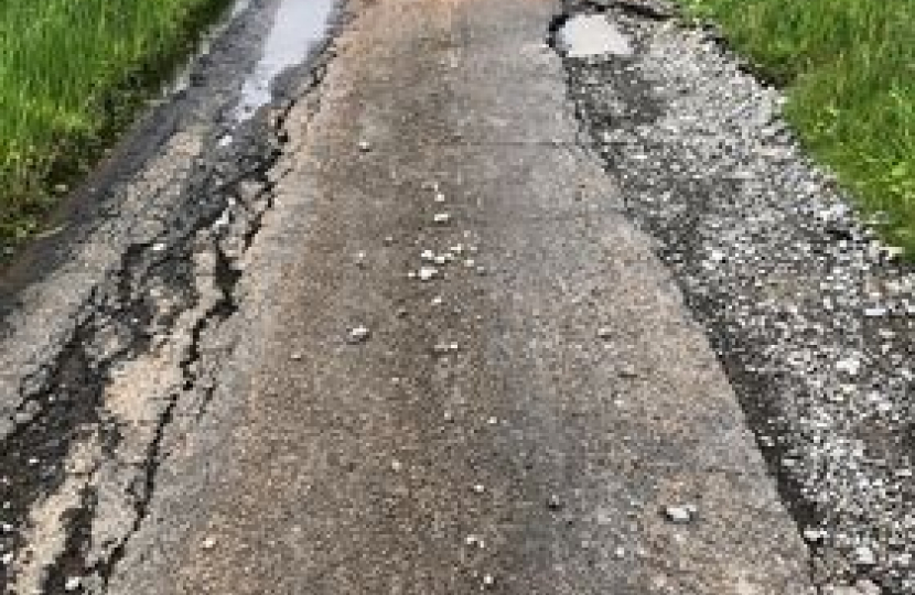 Road with large number of pot holes