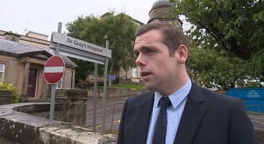 Douglas Ross MP outside Dr Gray's