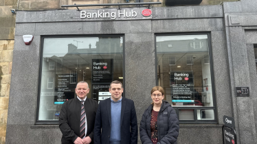 Douglas, Paul and Kathleen stand outside the new Forres Banking Hub